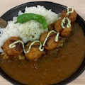 Ganesha Crispy Takoyaki Curry - Crispy Takoyaki octopus balls 5 pieces over our signature Japanese Curry