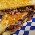 Pastrami Grilled Cheese Sandwich and Fries