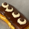 Filled Long John Donut with Peanut Butter cups