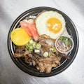 Thai BBQ pork bowl with fried egg
