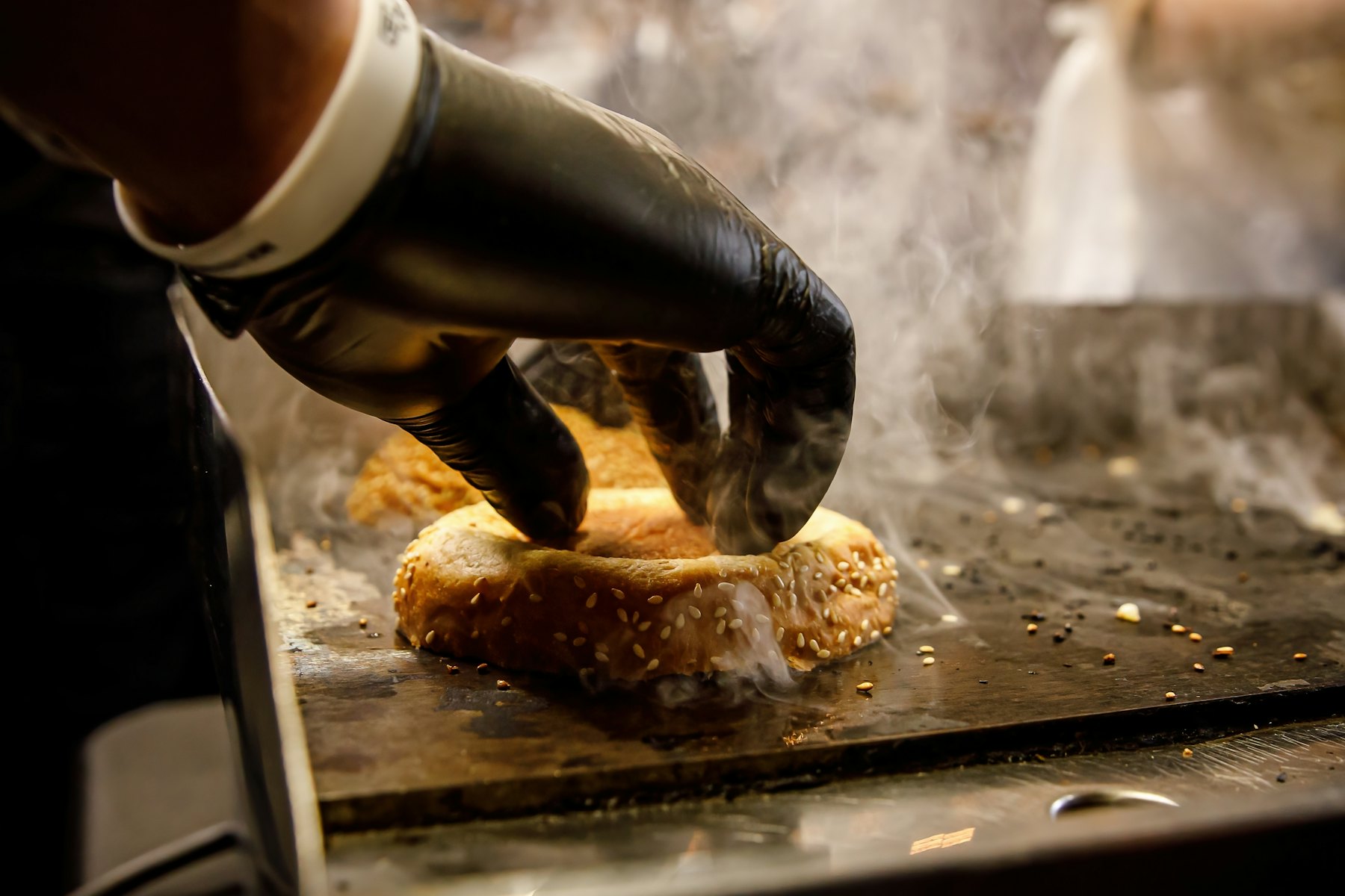 A smash burger being prepared on the grill at Hot Grill Killarney