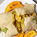 Roti/Dhalpuri  Chicken  (Halal)+ Plantain + Rice & Peas (Halal, Boneless) 