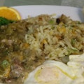 Nanas Pork Green Chile, 2 Fried Eggs, Hash Browns, Beans