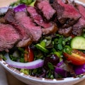 Entree Salad Topped with Picanha 