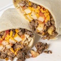 CALIFORNIA BURRITO-Carne Asada, French Fries, Cheese, Sour Cream, Guacamole, Pico