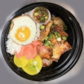 Thai BBQ chicken rice bowl with fried egg